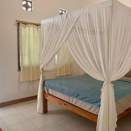 The Village Rua Beach Homestay Exterior photo