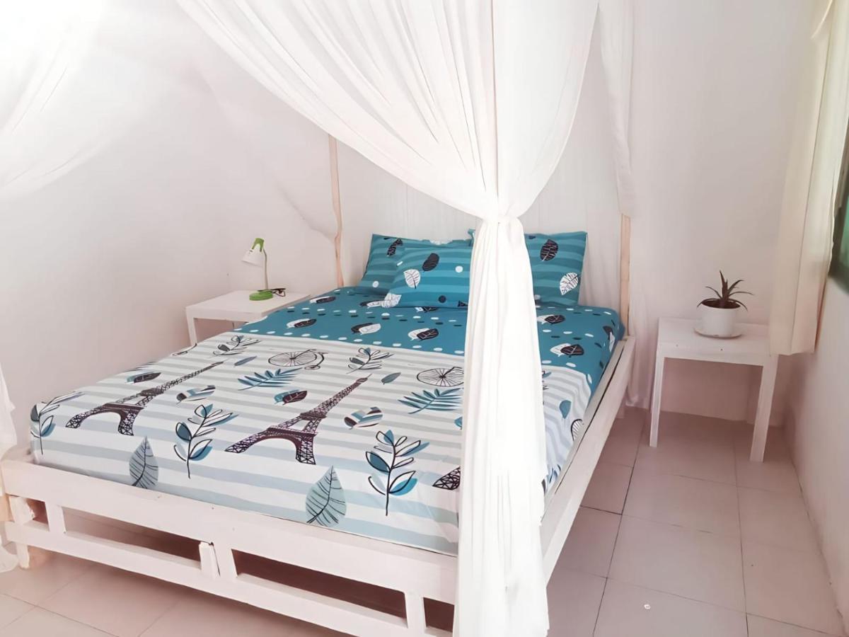 The Village Rua Beach Homestay Exterior photo