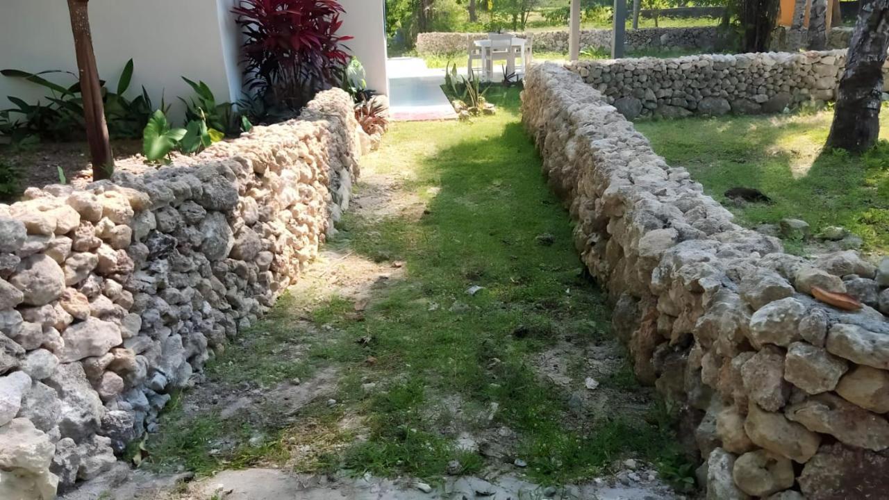 The Village Rua Beach Homestay Exterior photo