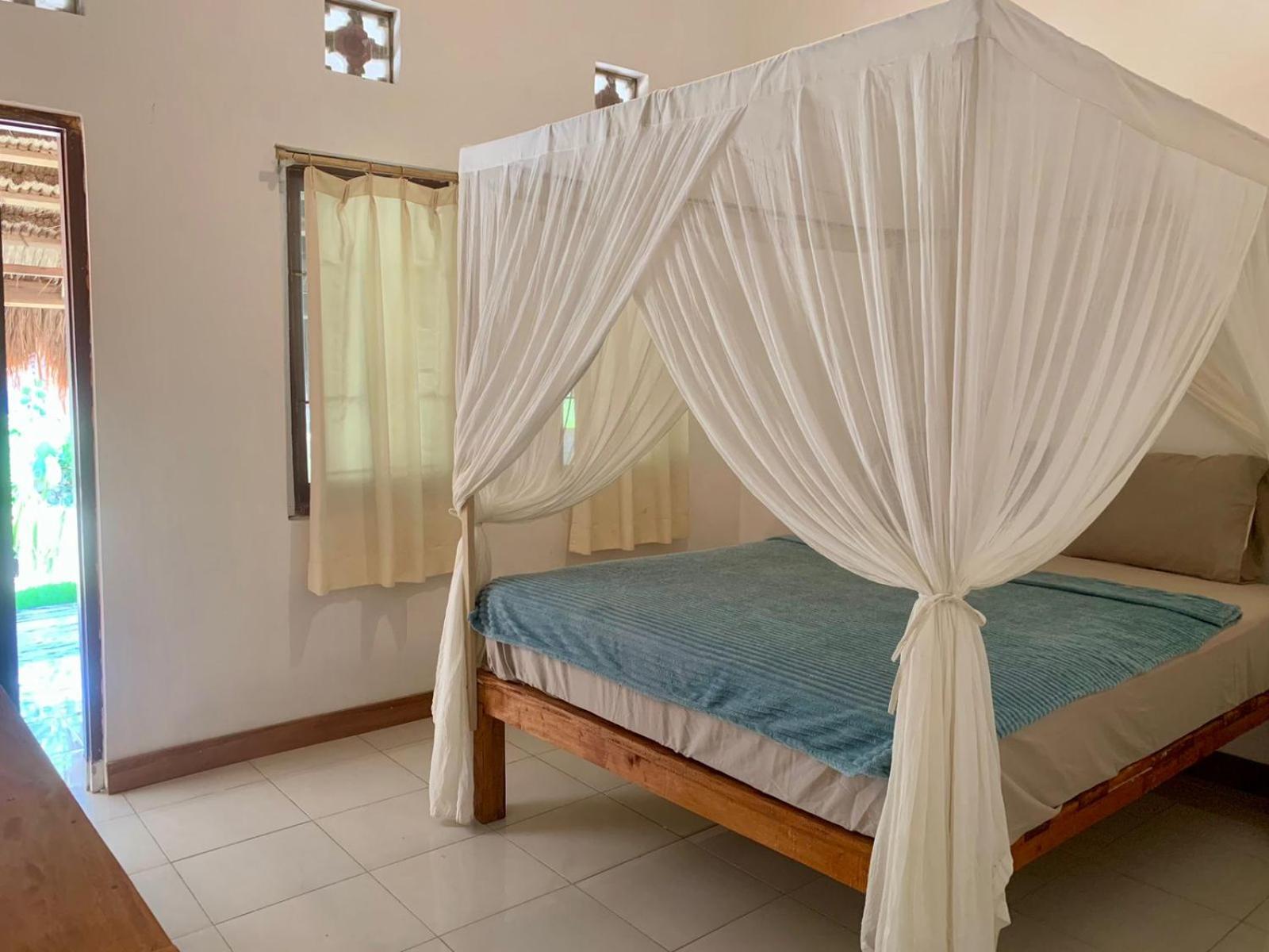 The Village Rua Beach Homestay Exterior photo